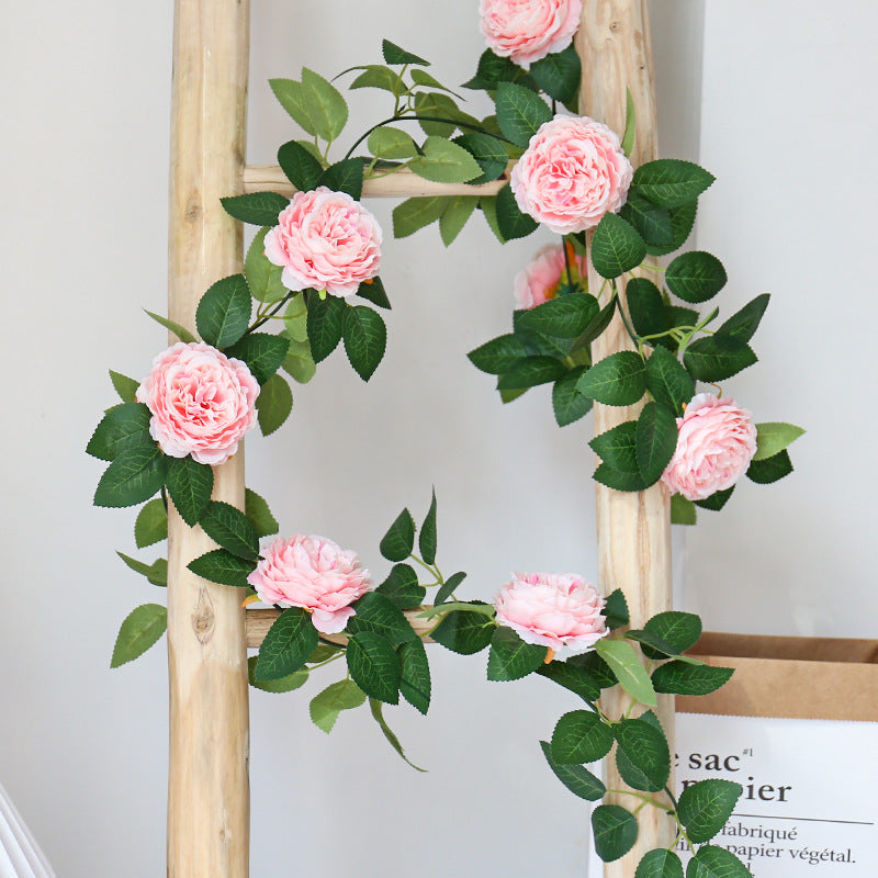 Artificial peony rose garland for home decor.