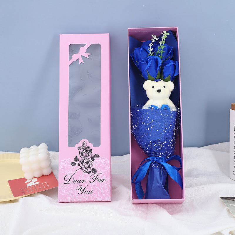 Elegant gift box featuring 5 soap roses and a teddy bear, perfect for romantic occasions and thoughtful gifts.