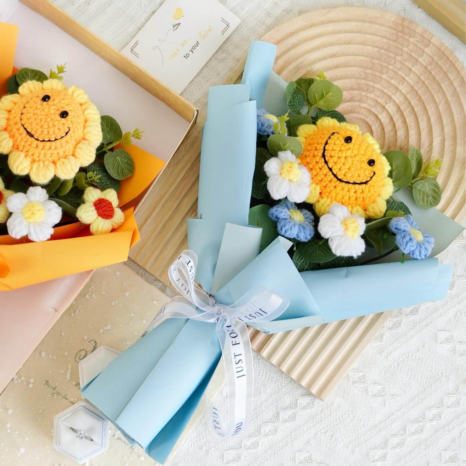 Hand-woven sunflower and rose bouquet, wrapped elegantly for festive occasions.