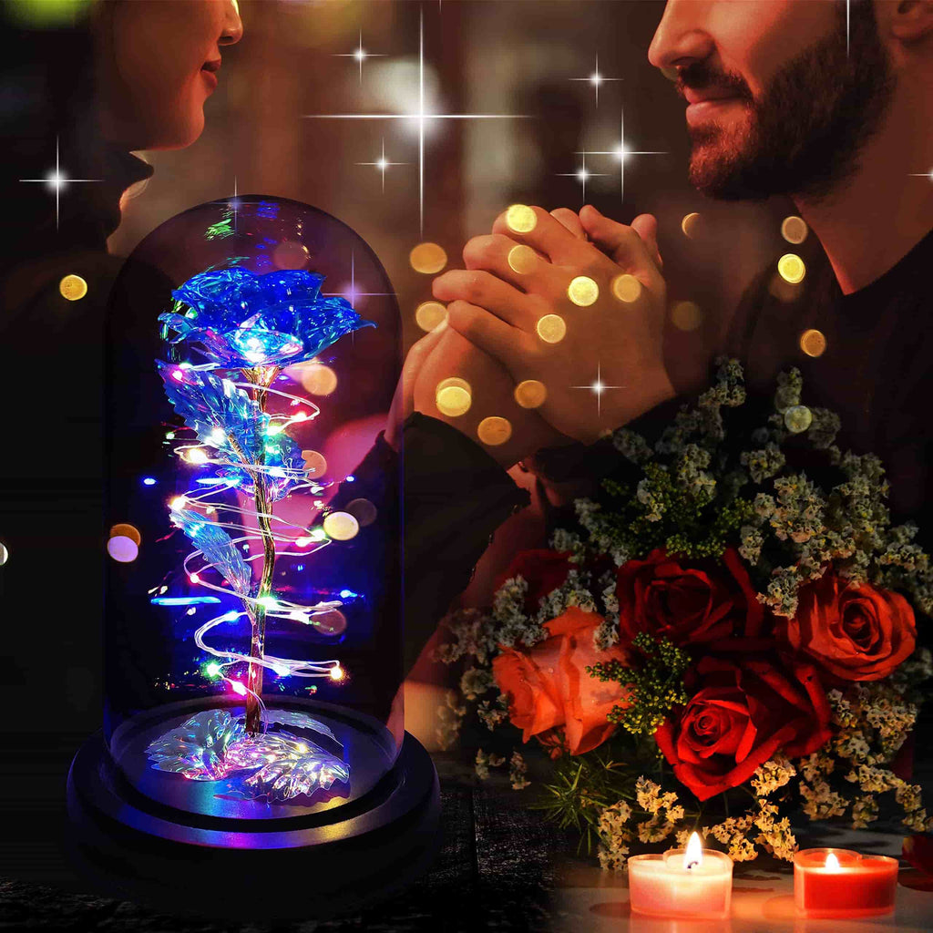 Eternal blue rose in a glass dome, illuminated by LED lights, ideal for special gifts.