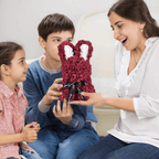 Burgundy floral bunny with roses, white accents, ribbon, and a love card, ideal for Easter, gifting to girlfriends, wives, and for anniversaries or special occasions