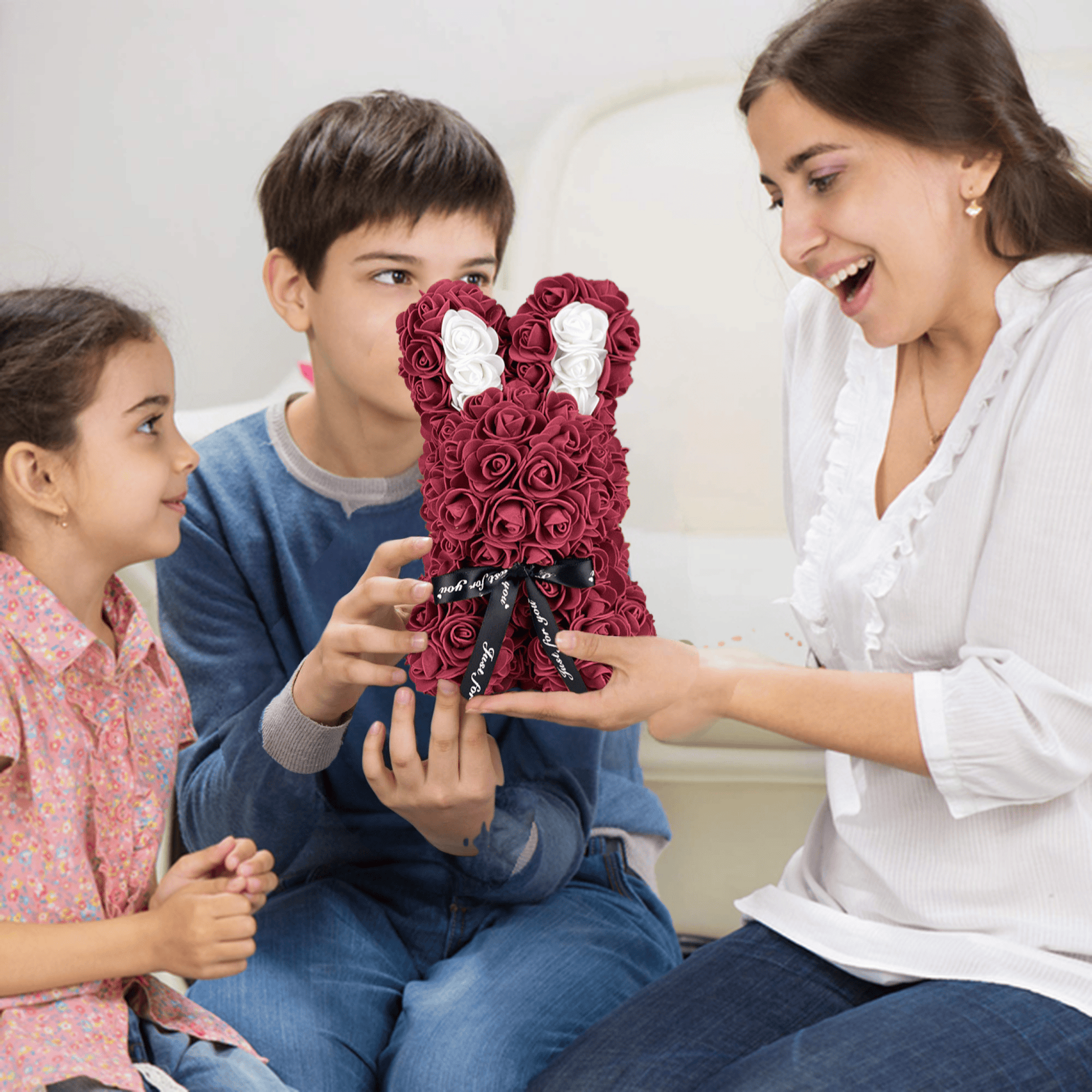 Burgundy floral bunny with roses, white accents, ribbon, and a love card, ideal for Easter, gifting to girlfriends, wives, and for anniversaries or special occasions