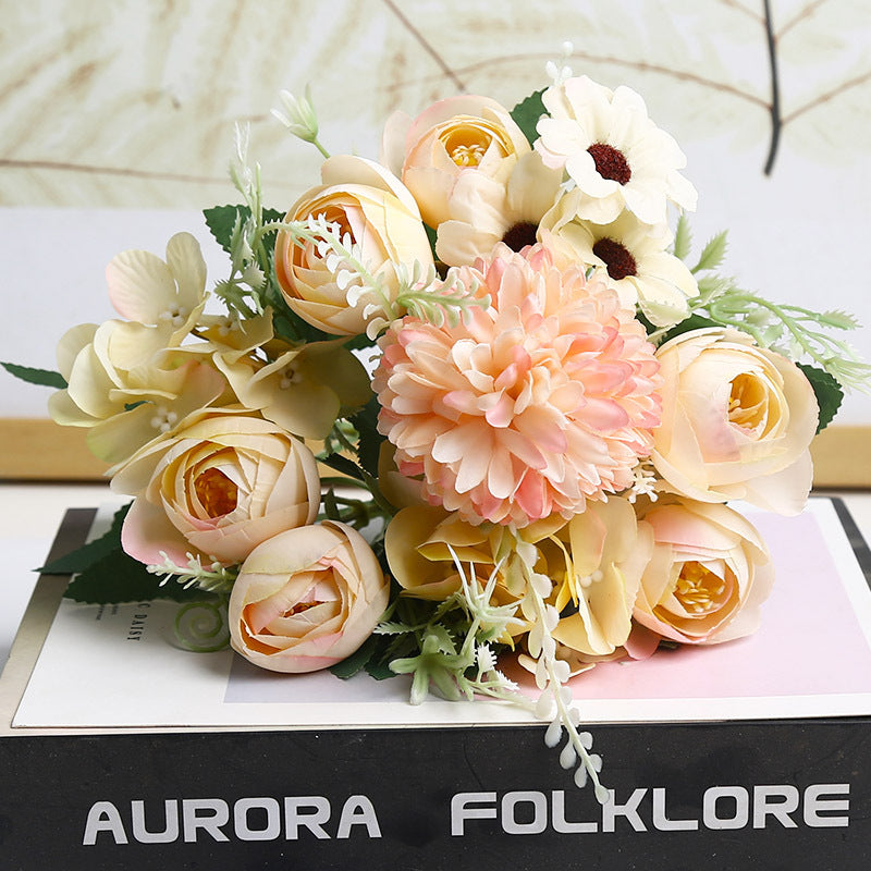 Elegant artificial flower bouquet in multiple colors.