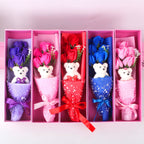 Aromatic soap roses and a soft teddy bear, carefully arranged in a decorative box, ideal for gifting loved ones.