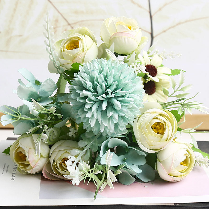 Low-maintenance silk flower centerpiece.