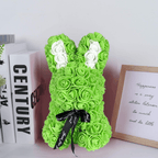 Green floral bunny with roses, white accents, ribbon, and a love card, ideal for Easter, gifting to girlfriends, wives, and for anniversaries or special occasions