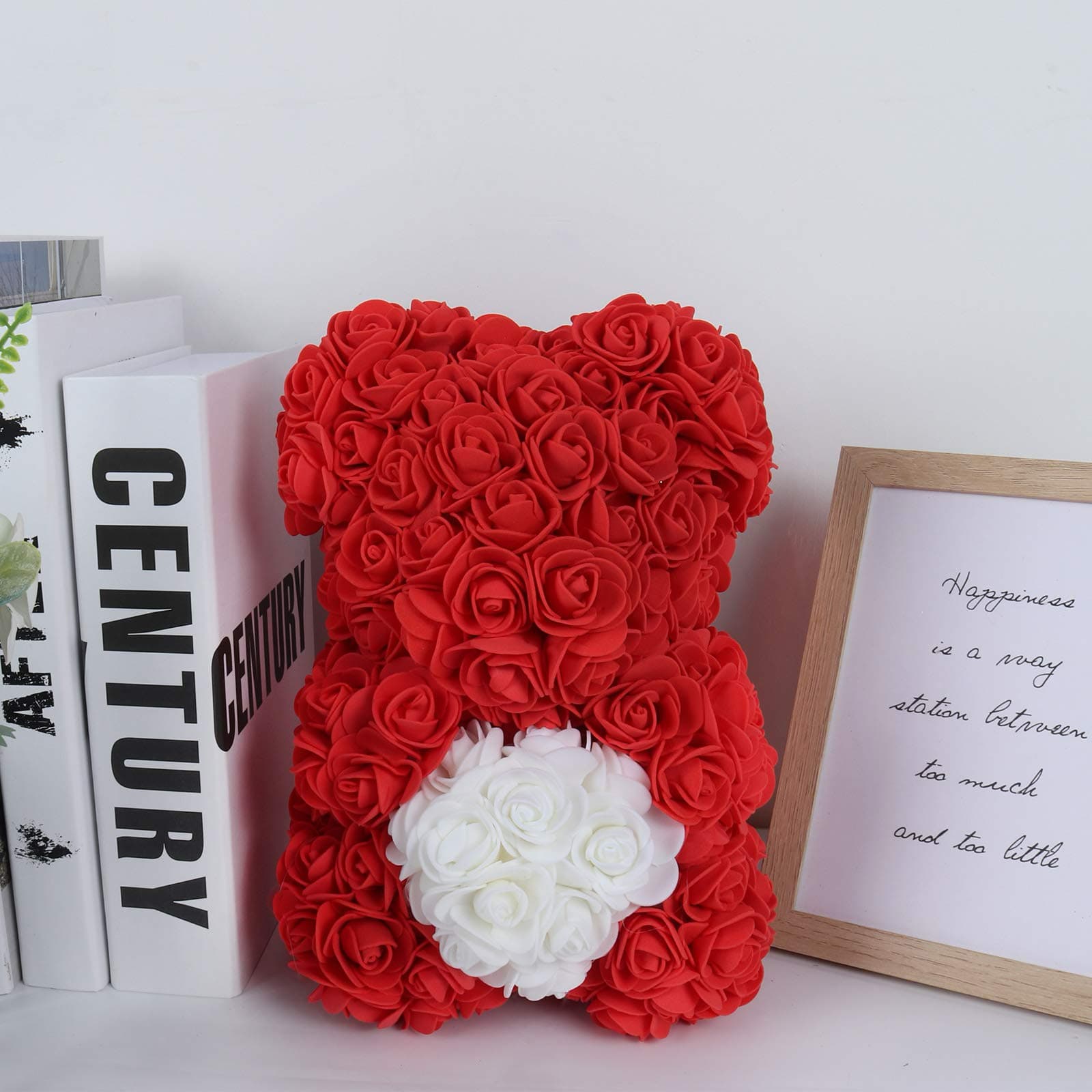 Artificial Flower rose bear with heart, enhanced by soft, glowing lights for a cozy atmosphere.