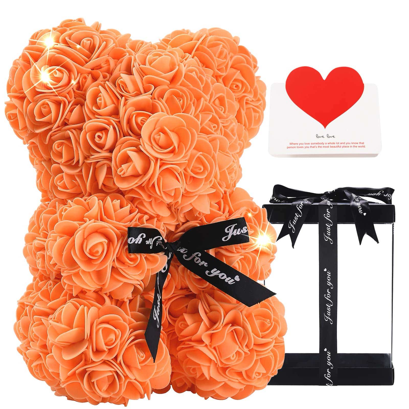A teddy bear crafted from artificial roses, complete with a ribbon, perfect for a memorable present.