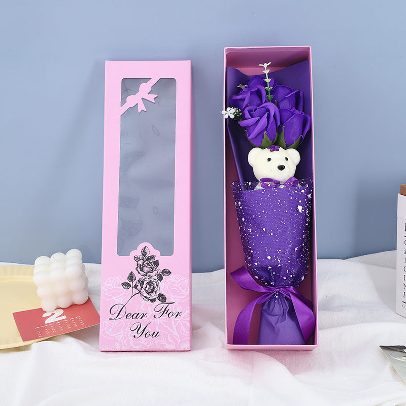 Thoughtfully designed gift set with five aromatic soap roses and a cuddly teddy bear, ideal for special celebrations.