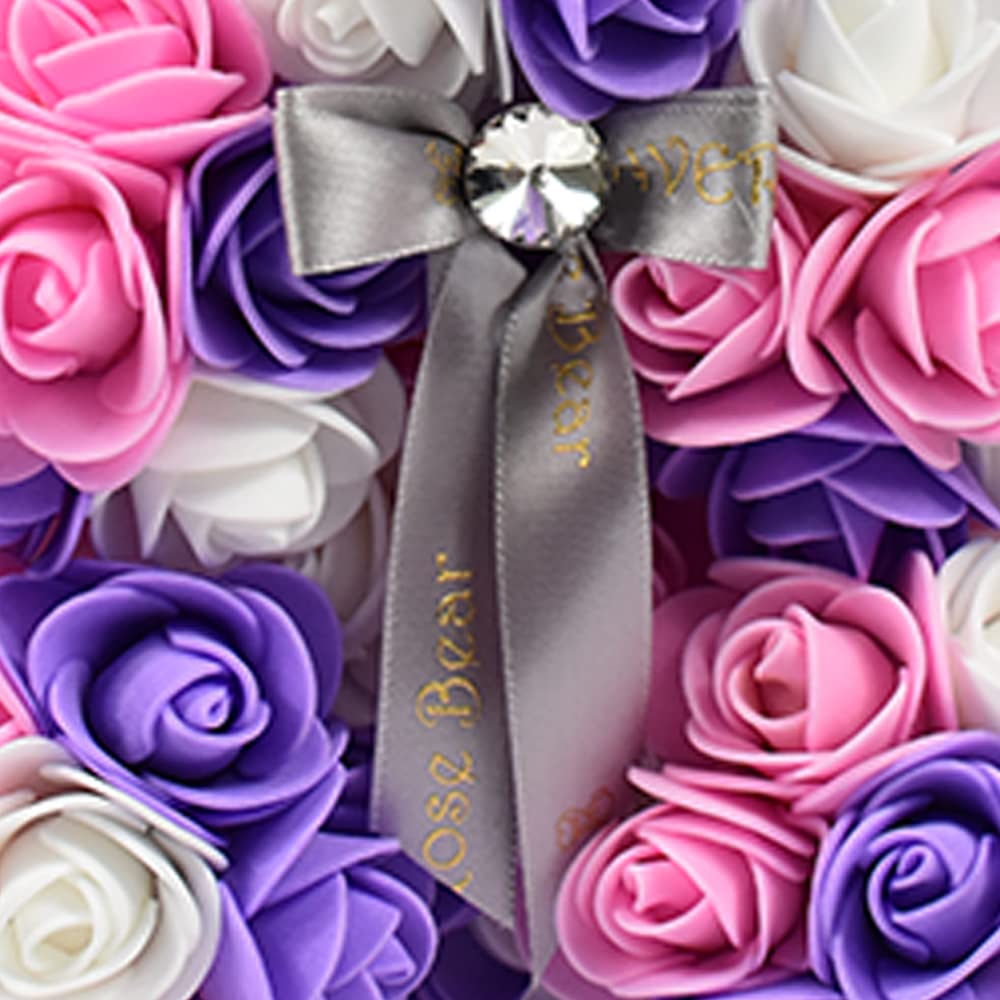 An artificial rose teddy bear, perfect for adding a touch of elegance to any room or as a unique gift idea.