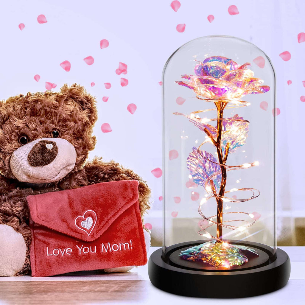 Beautiful rainbow rose with LED lights in a glass dome, a colorful decorative piece.