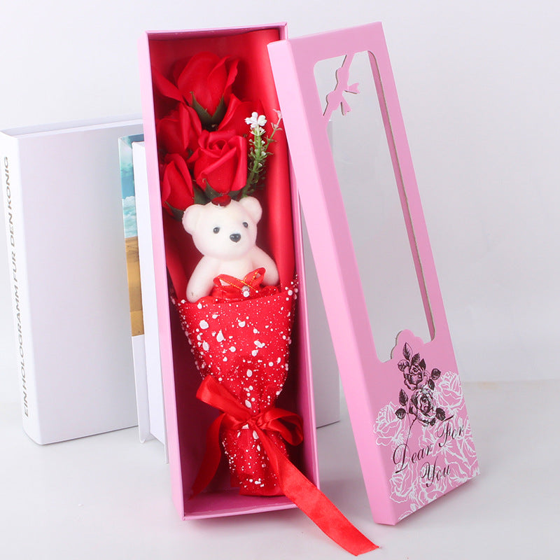 Beautifully arranged soap roses with a teddy bear, nestled in an elegant box, ideal for conveying love and gratitude.