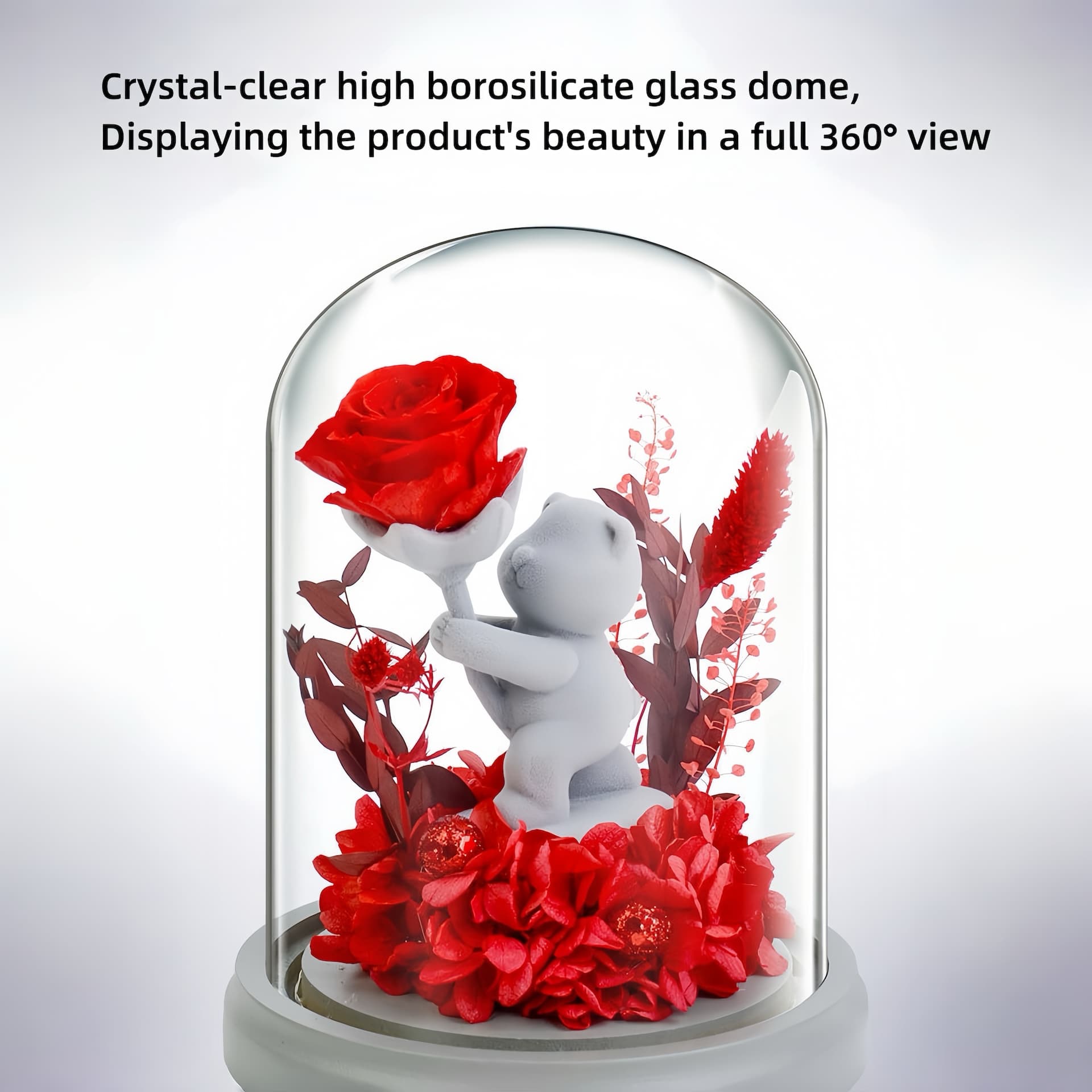 Flower presenting teddy bear in glass dome with multiple roses, ideal for expressing love on Valentine's Day or any romantic occasion.