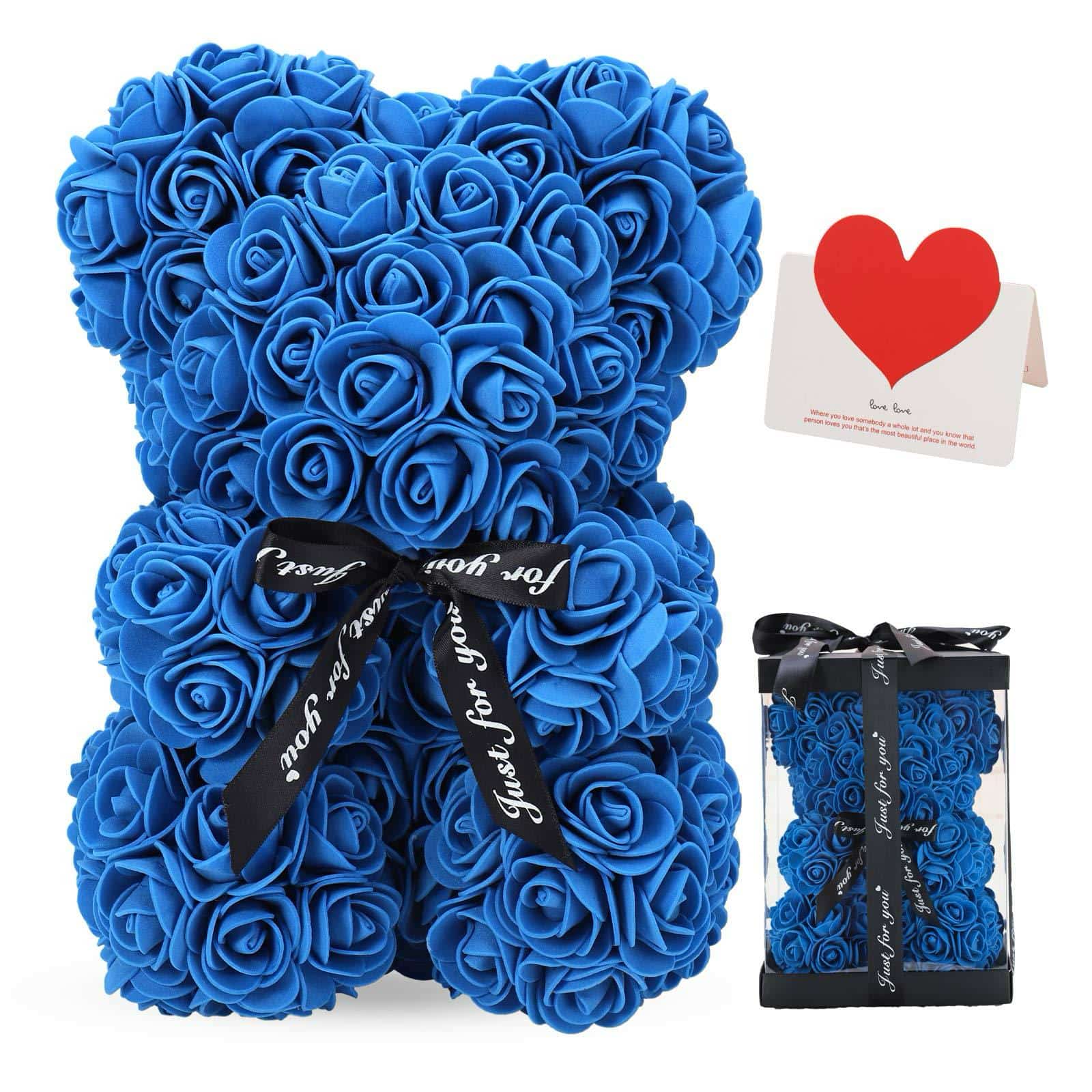 A charming teddy bear made from artificial rose petals, complete with a ribbon for added elegance.
