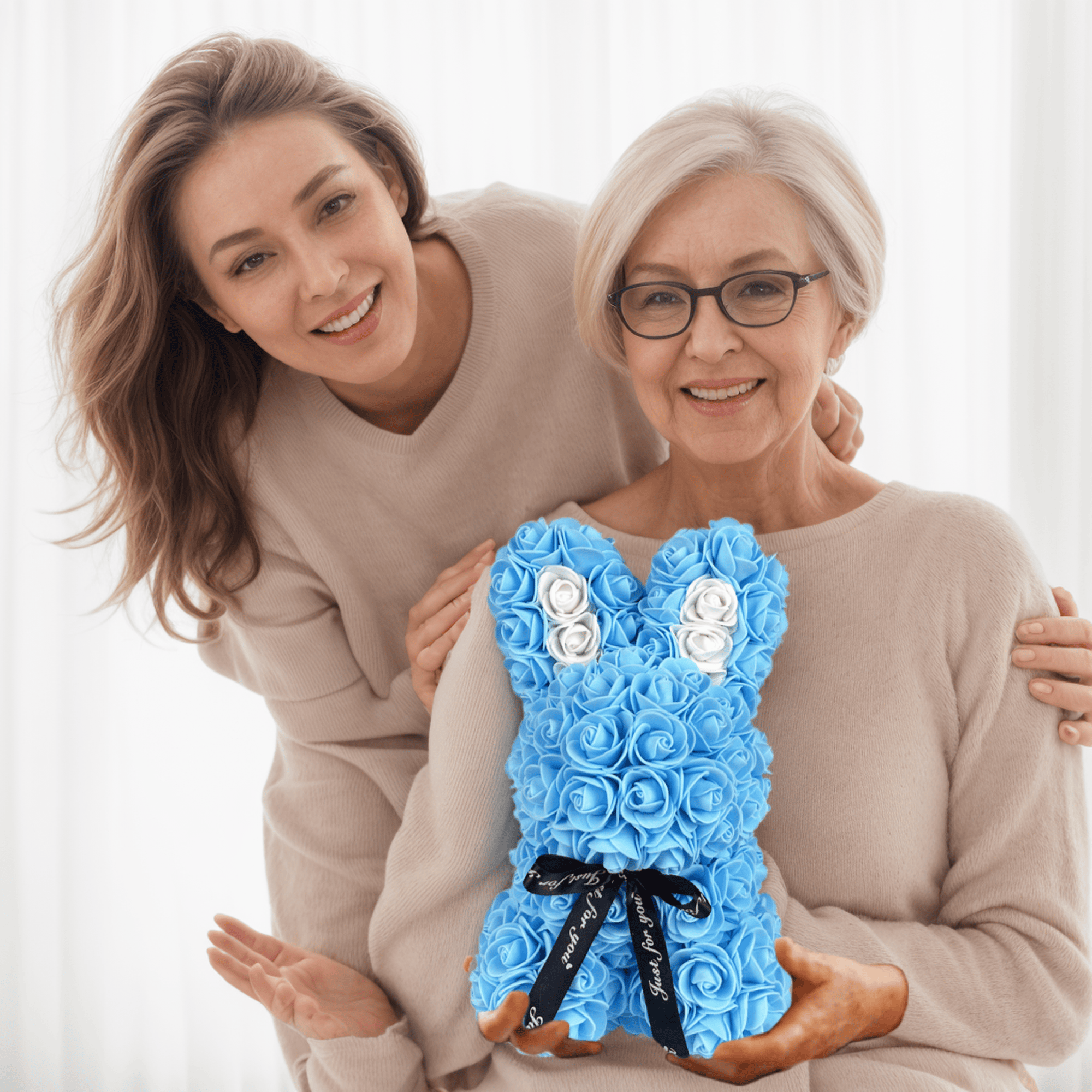 Sky Blue floral bunny with roses, white accents, ribbon, and a love card, ideal for Easter, gifting to girlfriends, wives, and for anniversaries or special occasions