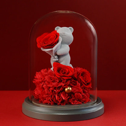 Romantic teddy bear holding an eternal rose inside a glass dome, perfect Valentine's Day gift for her or a unique birthday present.