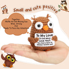 Tiny crochet owl plush on hand with love message