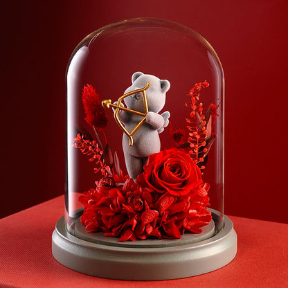 Confession teddy bear presenting a rose inside a glass dome, designed for Valentine's Day or as a romantic home decor piece.