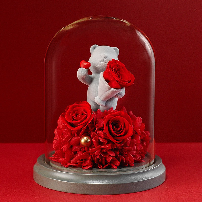 Multi-flower version of the confession teddy bear in a glass dome, featuring preserved roses, perfect for expressing love and appreciation.